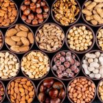 set-pecan-pistachios-almond-peanut-cashew-pine-nuts-lined-up-assorted-nuts-dried-fruits-mini-different-bowls-1024x696